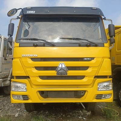 21-30t 부하 용량 371HP 타이어와 수압 스티어링 시스템 Sinotruk 덤프 트럭