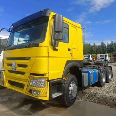 21-30t 부하 용량 371HP 타이어와 수압 스티어링 시스템 Sinotruk 덤프 트럭