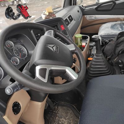 판매 HOWO 371HP 6X4 트랙터 트럭 사용 된 화물 운송 트럭 수동 변속기
